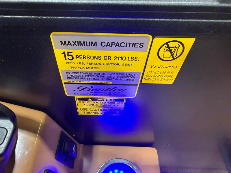 Slide: The Image of Warning sign on a boat with capacity and safety information. - 15