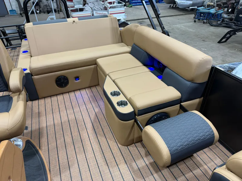 Slide: The Image of Interior of a Bentley Pontoons Elite 223 Swingback Tritoon with beige and gray upholstery. - 18