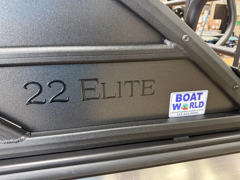 Slide: The Image of Close-up of the Bentley Pontoons Elite 223 Swingback Tritoon with "22 Elite" lettering. - 45