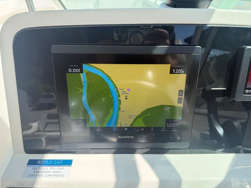 Slide: The Image of A Garmin navigation system on a World Cat 230 DC boat displays a map. - 10
