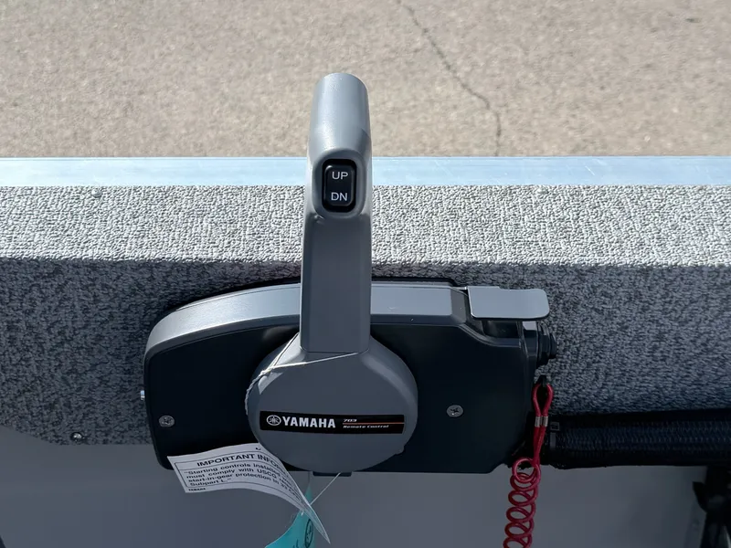 Slide: The Image of Close-up of a Yamaha throttle lever on a Starcraft boat. - 19
