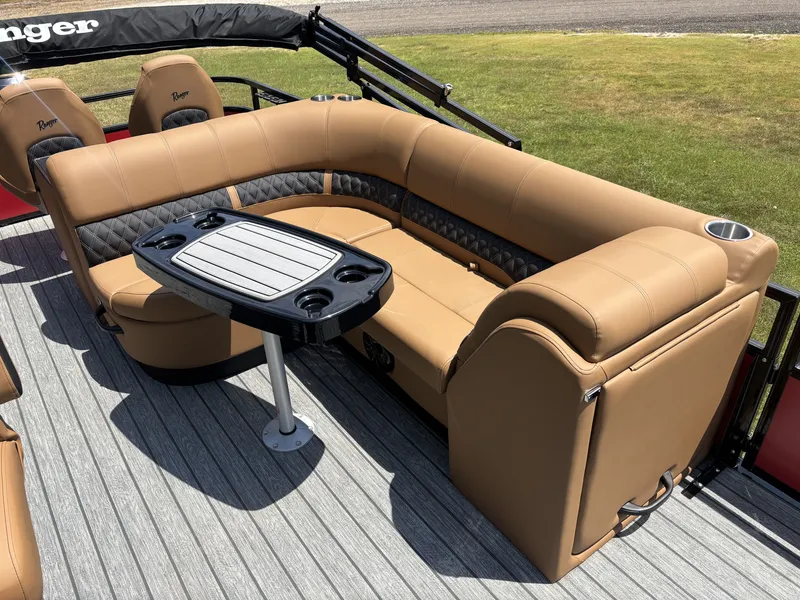 Slide: The Image of The image shows a luxurious seating area on a boat with a table in the center. - 15