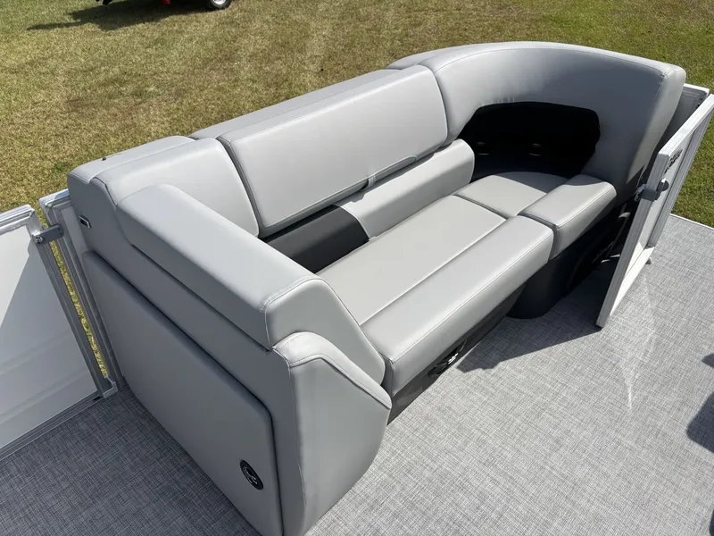 Slide: The Image of Gray seating on a boat with carpeted flooring. - 14