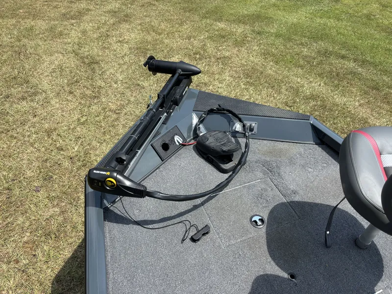 Slide: The Image of The image shows the deck of a 2025 Ranger RT RT188C boat with a trolling motor. - 17