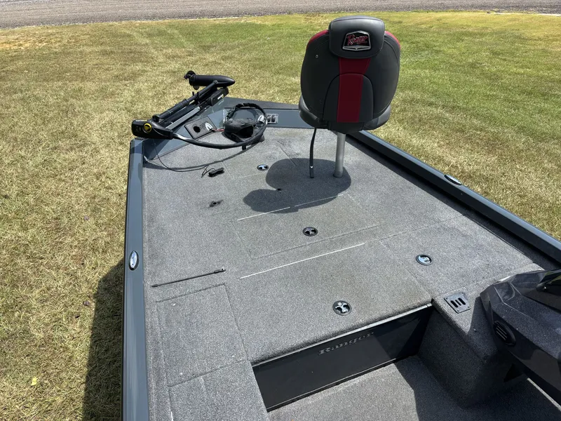 Slide: The Image of The image shows the deck of a 2025 Ranger RT RT188C boat with a seat and controls. - 16