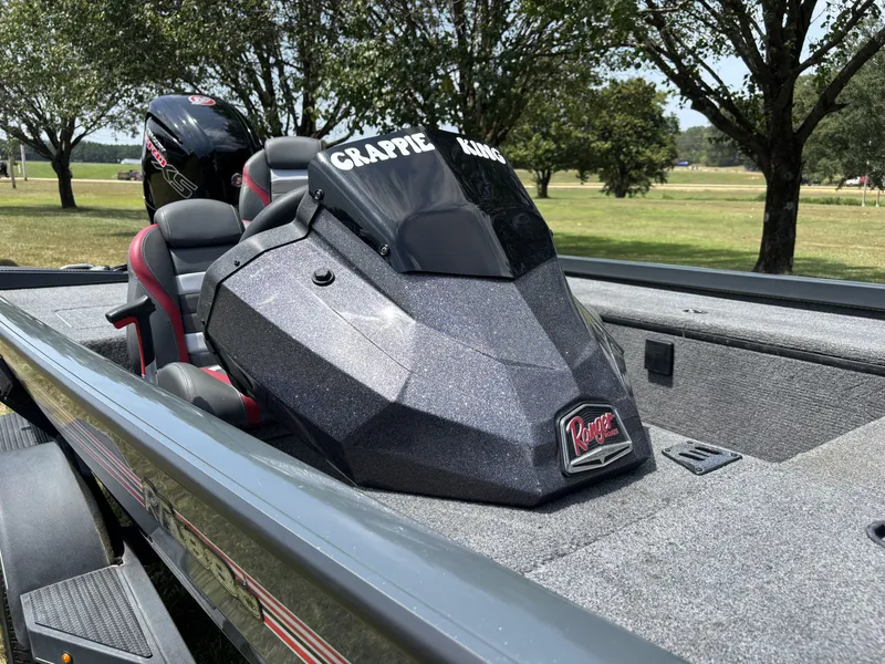 Slide: The Image of The image shows a 2025 Ranger RT RT188C boat with a "Crappie King" sign. - 10