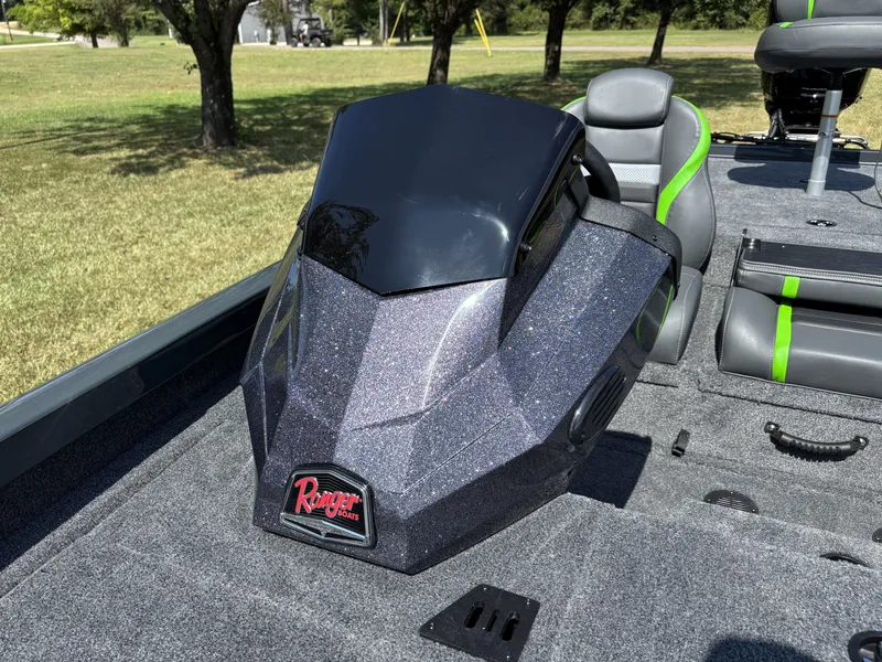 Slide: The Image of The image shows the cockpit of a 2027 Ranger RT RT198P boat with a sleek design. - 18
