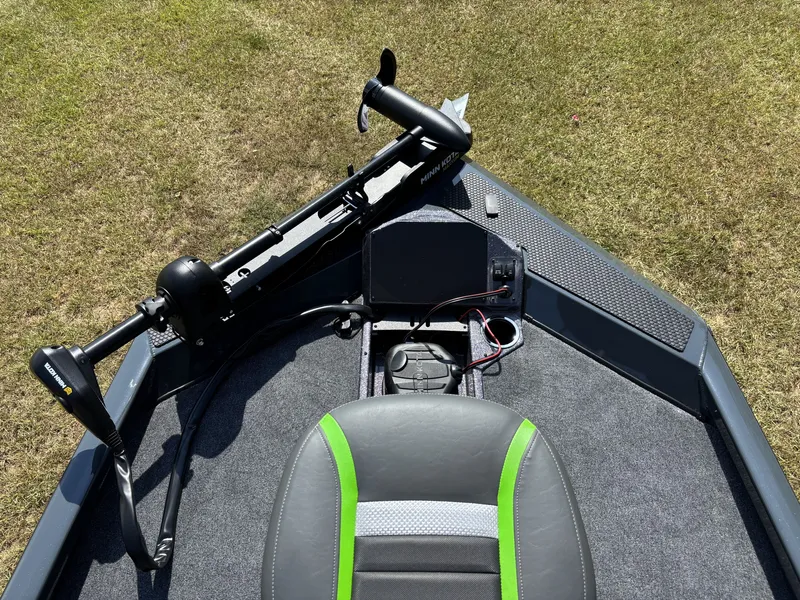 Slide: The Image of The image shows the cockpit of a 2027 Ranger RT RT198P boat with a seat and controls. - 16
