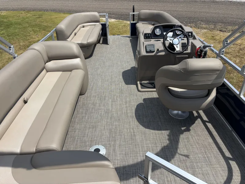 Slide: The Image of The image shows the interior of a 2025 Ranger REATA CLASSIC SERIES 200C with beige seating. - 15