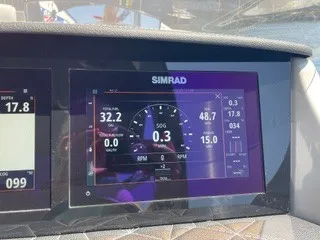 Slide: The Image of A Simrad display on a boat shows speed, depth, and other navigation data. - 23