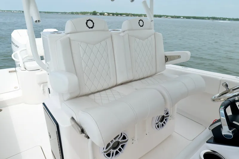 Slide: The Image of 2025 Fountain 34 Tournament Edition boat with luxurious white seating and modern controls. - 15