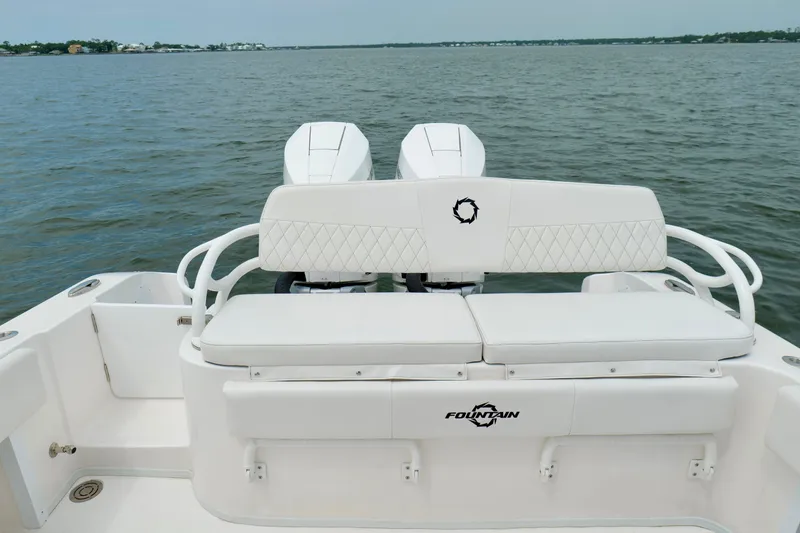 Slide: The Image of 2025 Fountain 34 Tournament Edition boat with dual engines on open water. - 18