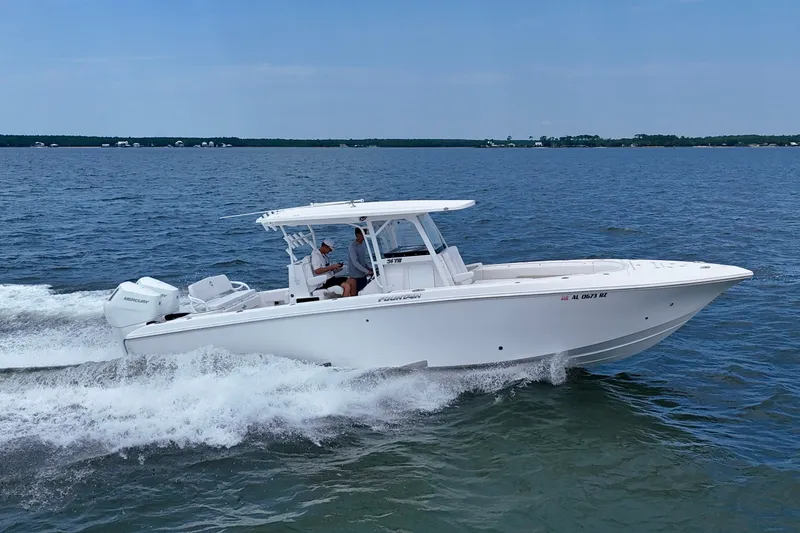 Slide: The Image of 2025 Fountain 34 Tournament Edition boat cruising on open water. - 40