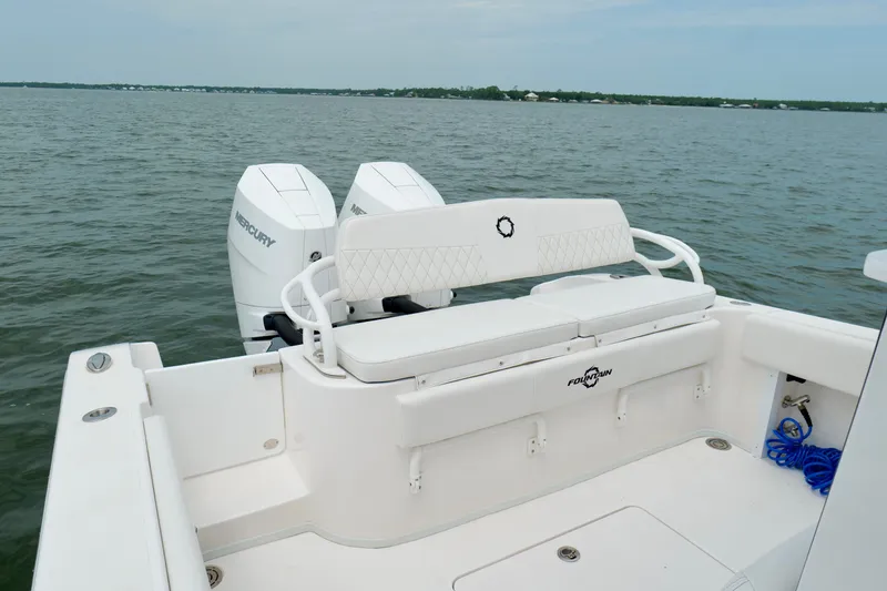 Slide: The Image of 2025 Fountain 34 Tournament Edition boat with dual Mercury engines on open water. - 17