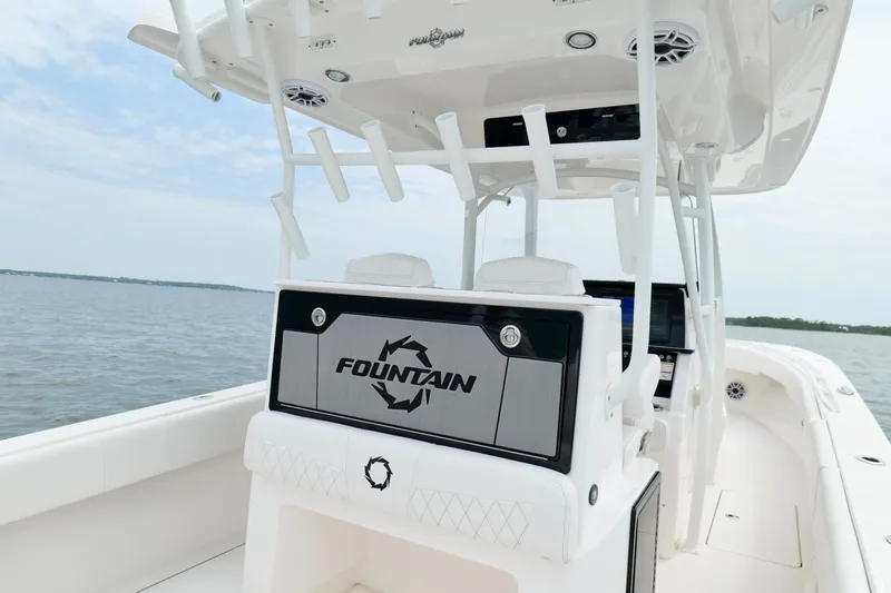 Slide: The Image of 2025 Fountain 34 Tournament Edition boat interior with sleek design on open water. - 25
