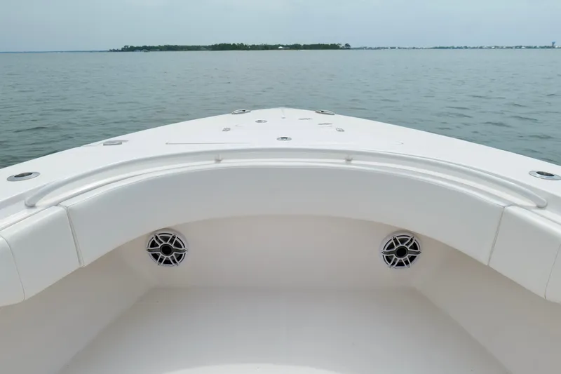 Slide: The Image of 2025 Fountain 34 Tournament Edition boat bow on calm water. - 33