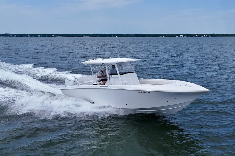Slide: The Image of 2025 Fountain 34 Tournament Edition boat cruising on open water. - 41