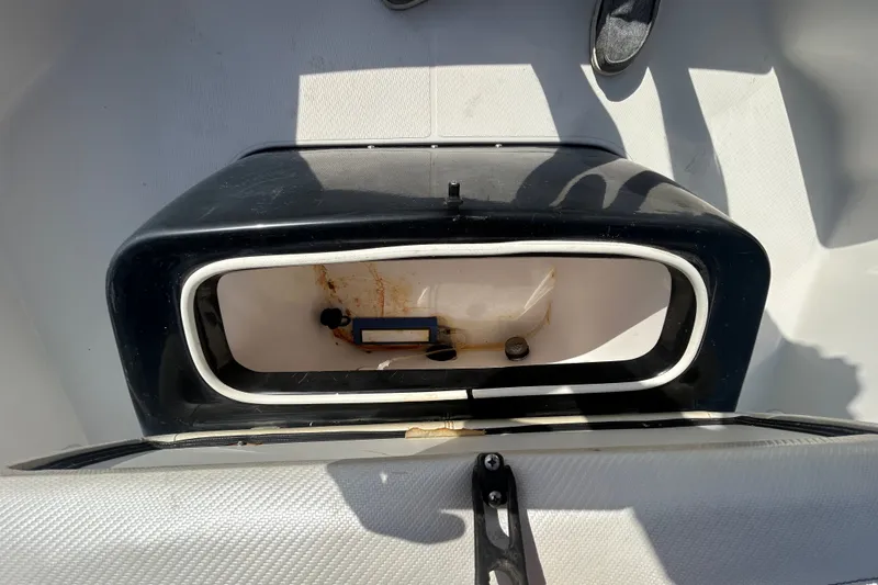 Slide: The Image of Open storage compartment on 2016 Blue Wave 2000 PureBay boat, showing interior details. - 15