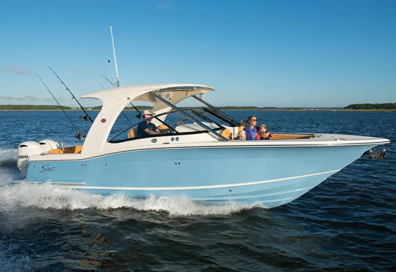 The Image of Manufacturer Provided Image: 2015 Scout 275 Dorado boat cruising on open water. - 1