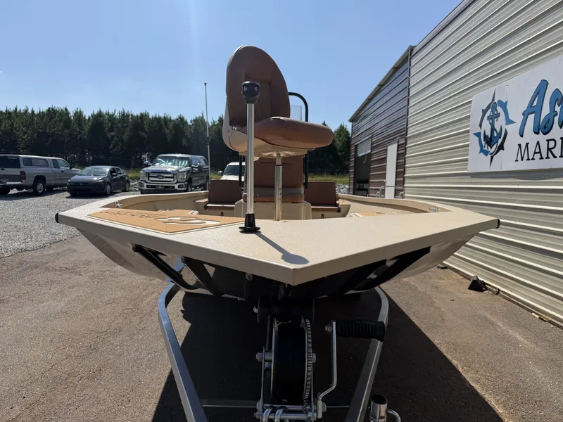 Slide: The Image of A 2027 G3 Bay GX21 TUNNEL-150HP SHO boat on a trailer. It features a raised helm seat. - 2