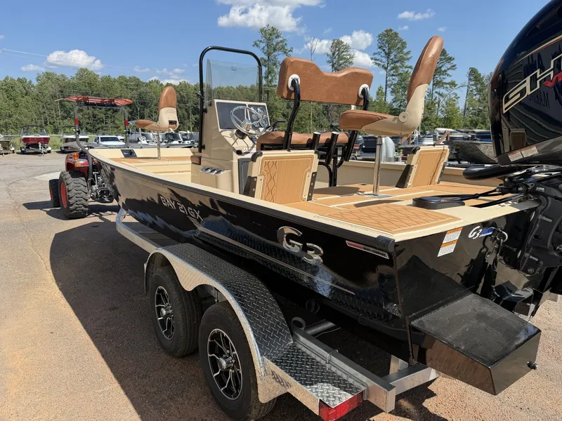 Slide: The Image of 2027 G3 Bay GX21 TUNNEL-150HP SHO boat on a trailer. - 4