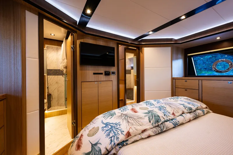 Slide: The Image of Luxurious interior of 2023 North Pacific 53 Euro yacht with elegant wood finishes and modern amenities. - 38