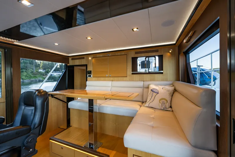 Slide: The Image of Luxurious interior of 2023 North Pacific 53 Euro yacht with plush seating and elegant design. - 27