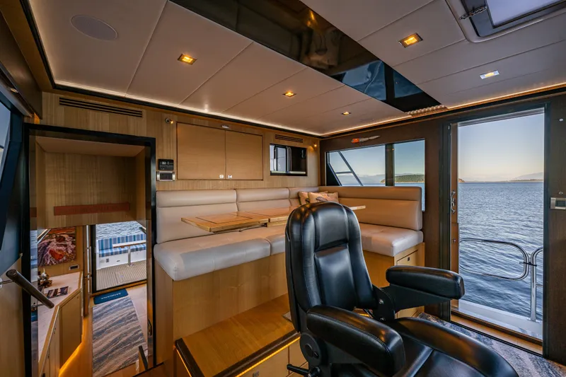 Slide: The Image of Luxurious interior of 2023 North Pacific 53 Euro yacht with ocean view. - 24