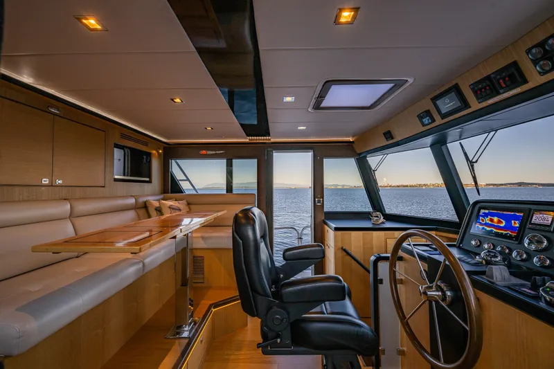 Slide: The Image of Luxurious interior of 2023 North Pacific 53 Euro yacht with panoramic ocean view. - 26