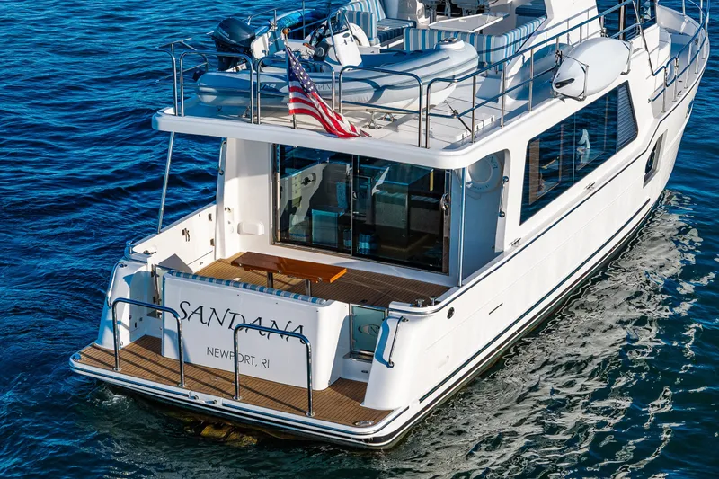 Slide: The Image of 2023 North Pacific 53 Euro yacht cruising on blue ocean waters. - 67