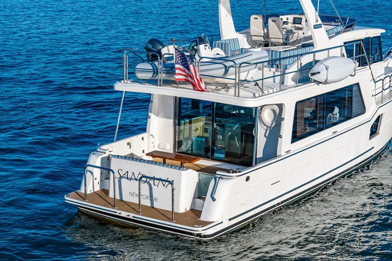 Slide: The Image of Luxury 2023 North Pacific 53 Euro yacht cruising on open water. - 98