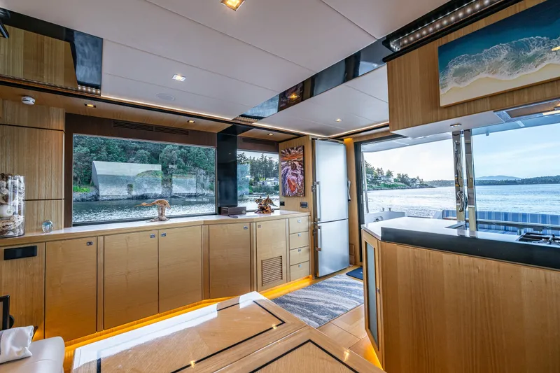 Slide: The Image of Luxurious interior of 2023 North Pacific 53 Euro yacht with scenic water views. - 17