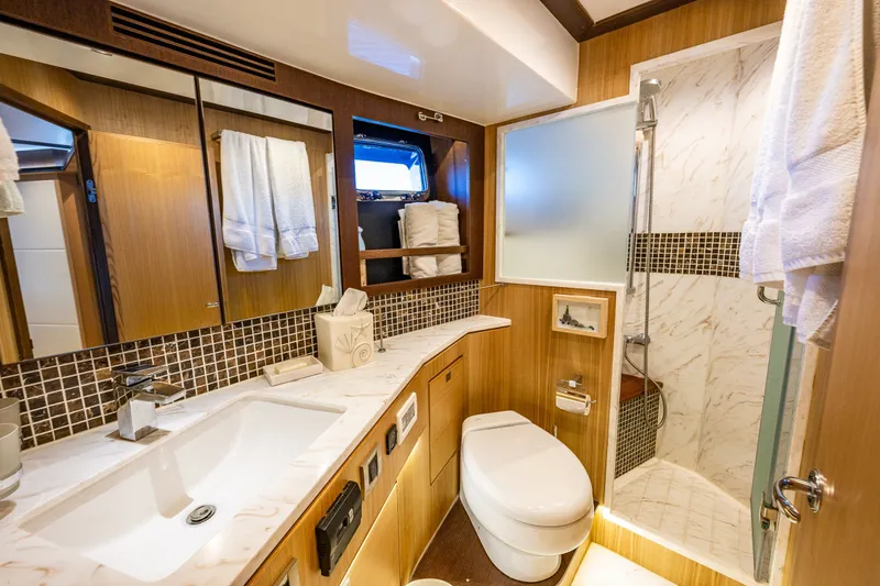 Slide: The Image of Luxurious bathroom in 2023 North Pacific 53 Euro yacht, featuring modern fixtures and elegant design. - 39