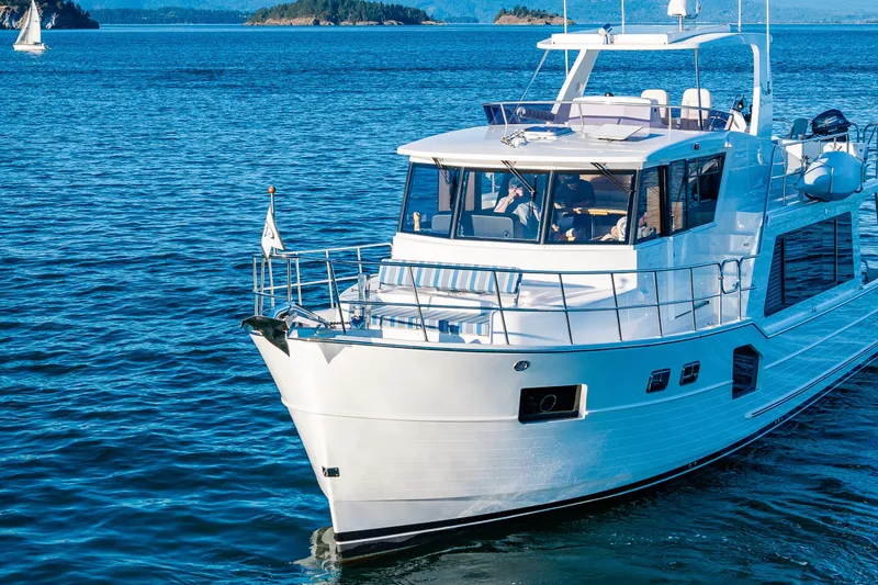 Slide: The Image of 2023 North Pacific 53 Euro yacht cruising on serene blue waters. - 90