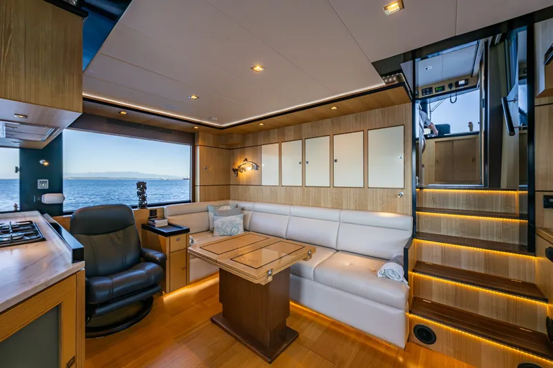 Slide: The Image of Luxurious interior of 2023 North Pacific 53 Euro yacht with ocean view and elegant furnishings. - 16