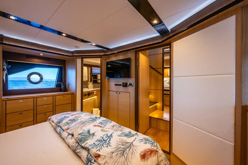 Slide: The Image of Luxurious interior of 2023 North Pacific 53 Euro yacht, featuring elegant wood finishes and modern amenities. - 37