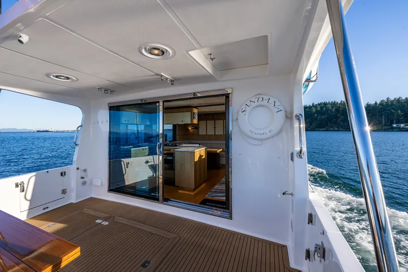 Slide: The Image of Luxury 2023 North Pacific 53 Euro yacht with open deck and ocean view. - 71
