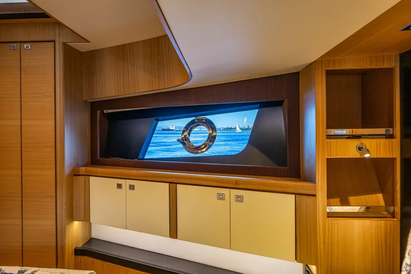 Slide: The Image of Luxurious interior of 2023 North Pacific 53 Euro yacht with elegant wood finishes and ocean view. - 44