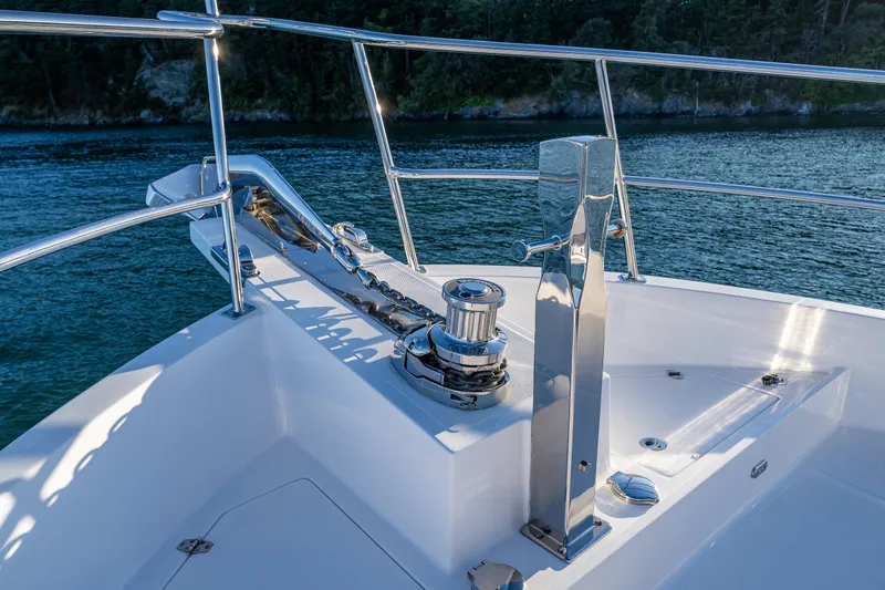 Slide: The Image of Bow of 2023 North Pacific 53 Euro yacht with anchor chain and railing. - 66
