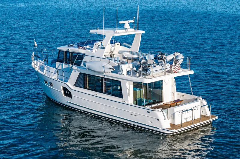 Slide: The Image of 2023 North Pacific 53 Euro yacht cruising on open water. - 99