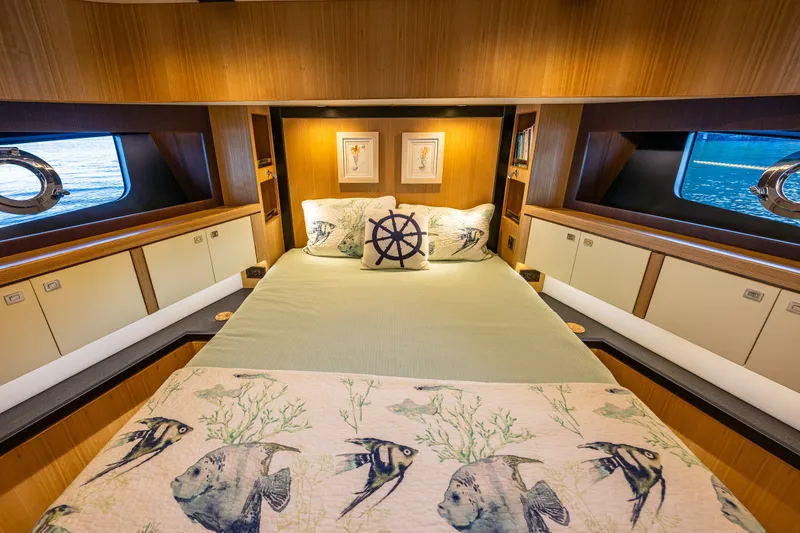 Slide: The Image of Luxurious cabin interior of 2023 North Pacific 53 Euro yacht with nautical decor. - 42
