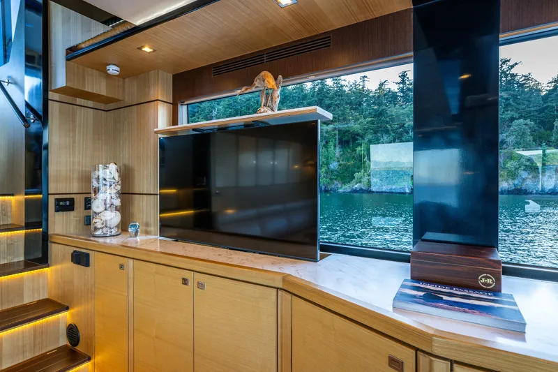 Slide: The Image of Luxurious interior of 2023 North Pacific 53 Euro yacht with scenic water view. - 14
