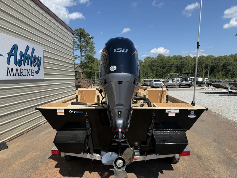 Slide: The Image of A G3 Bay GX21 Tunnel boat with a 150HP engine, parked on a trailer at Ashley Marine. - 8
