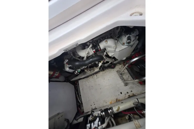 Slide: The Image of Engine compartment of a 2005 Tiara Yachts 3600 Open, showcasing mechanical components. - 26