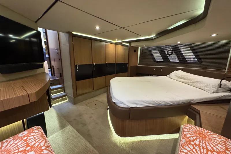 Slide: The Image of Luxurious 2016 Sea Ray L590 yacht bedroom with modern design and ambient lighting. - 24