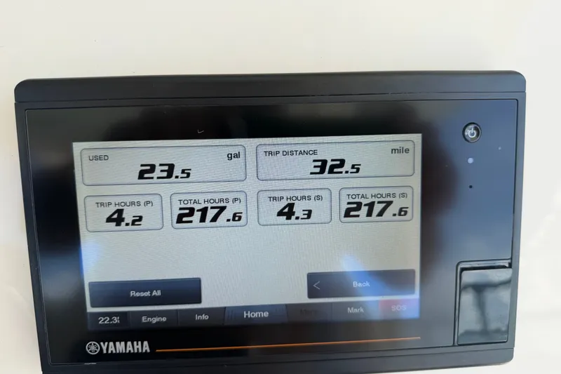 Slide: The Image of Yamaha display showing fuel usage and trip data for 2021 Grady-White Canyon 326 boat. - 66
