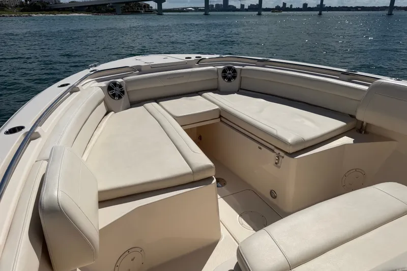 Slide: The Image of Luxurious seating area on a 2021 Grady-White Canyon 326 boat, with scenic water view. - 44