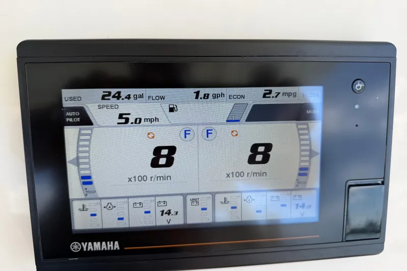 Slide: The Image of Yamaha display showing fuel usage and speed on 2021 Grady-White Canyon 326 boat. - 106