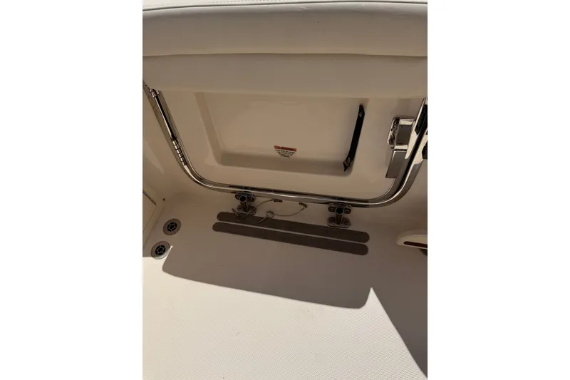 Slide: The Image of 2021 Grady-White Canyon 326 boat interior detail with stainless steel railing. - 103