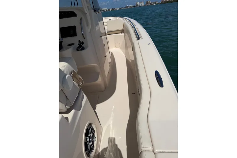 Slide: The Image of 2021 Grady-White Canyon 326 boat interior with seating and ocean view. - 111
